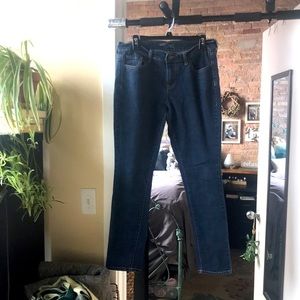 Flirty boot cut blue jeans dark wash